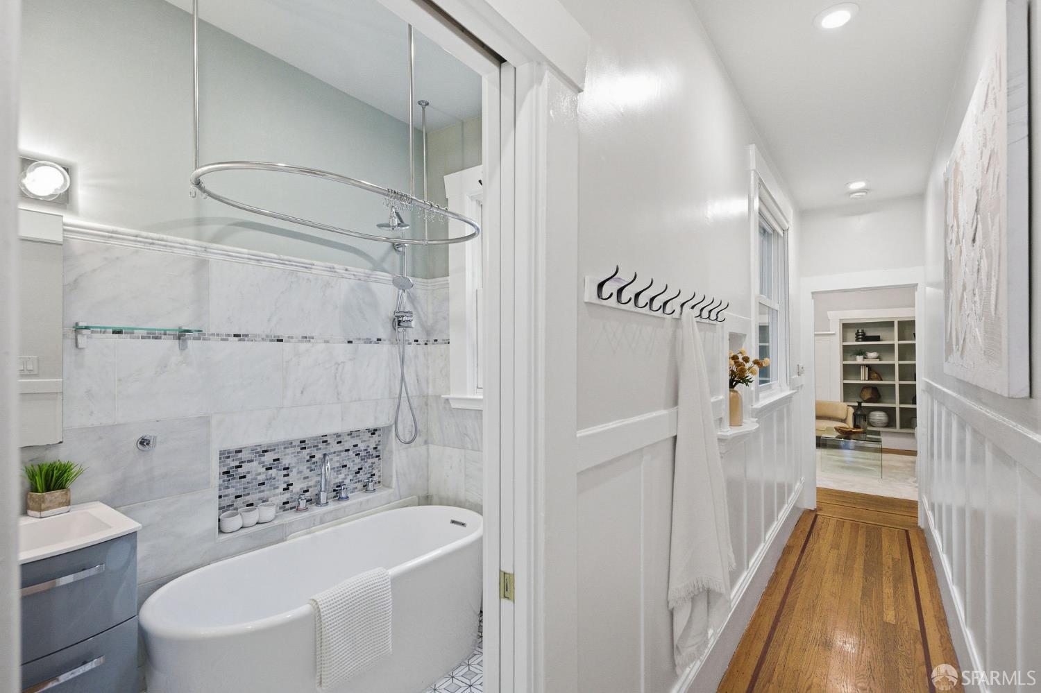 3452 18th Street, Unit A San Francisco, CA 94110 - Photo 27 of 39 a bathroom with a bathtub and a shower
