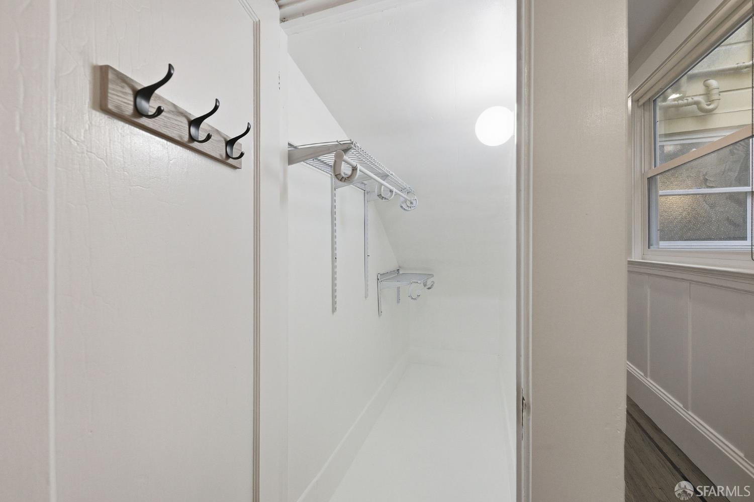 3452 18th Street, Unit A San Francisco, CA 94110 - Photo 7 of 39 a bathroom with a glass shower door