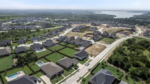 an aerial view of a city with lots of residential buildings