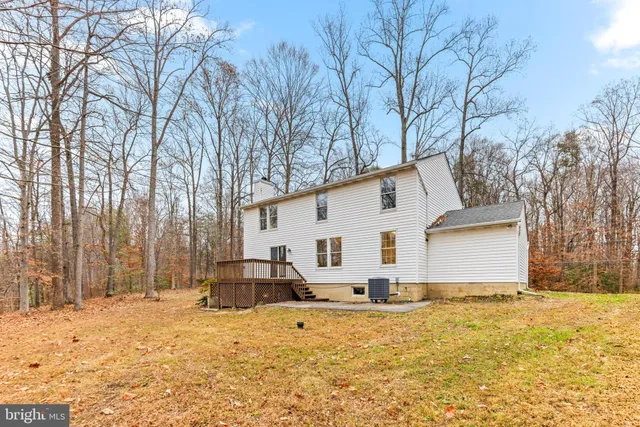 a view of a house with snow on the background