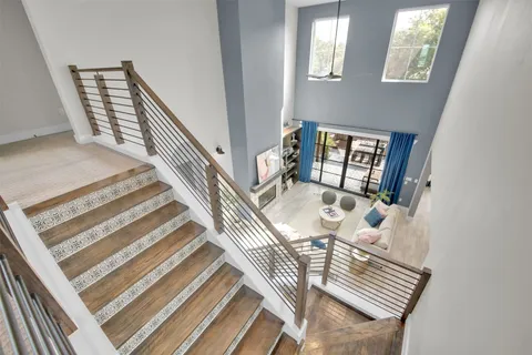 a view of an empty room with windows