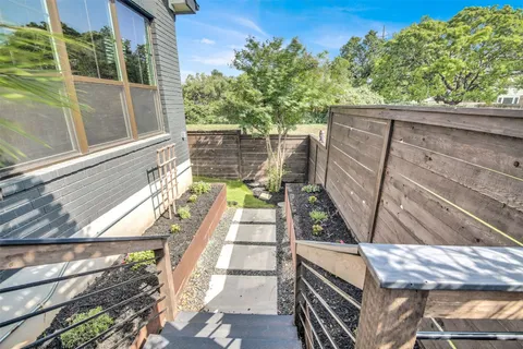 a backyard of a house with seating space