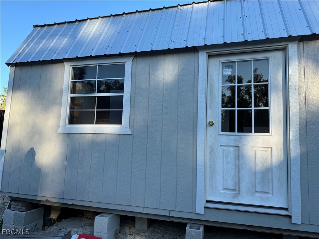 32576 Oil Well Road Punta Gorda, FL 33955 - Photo 21 of 30 a view of door with wooden cabinet