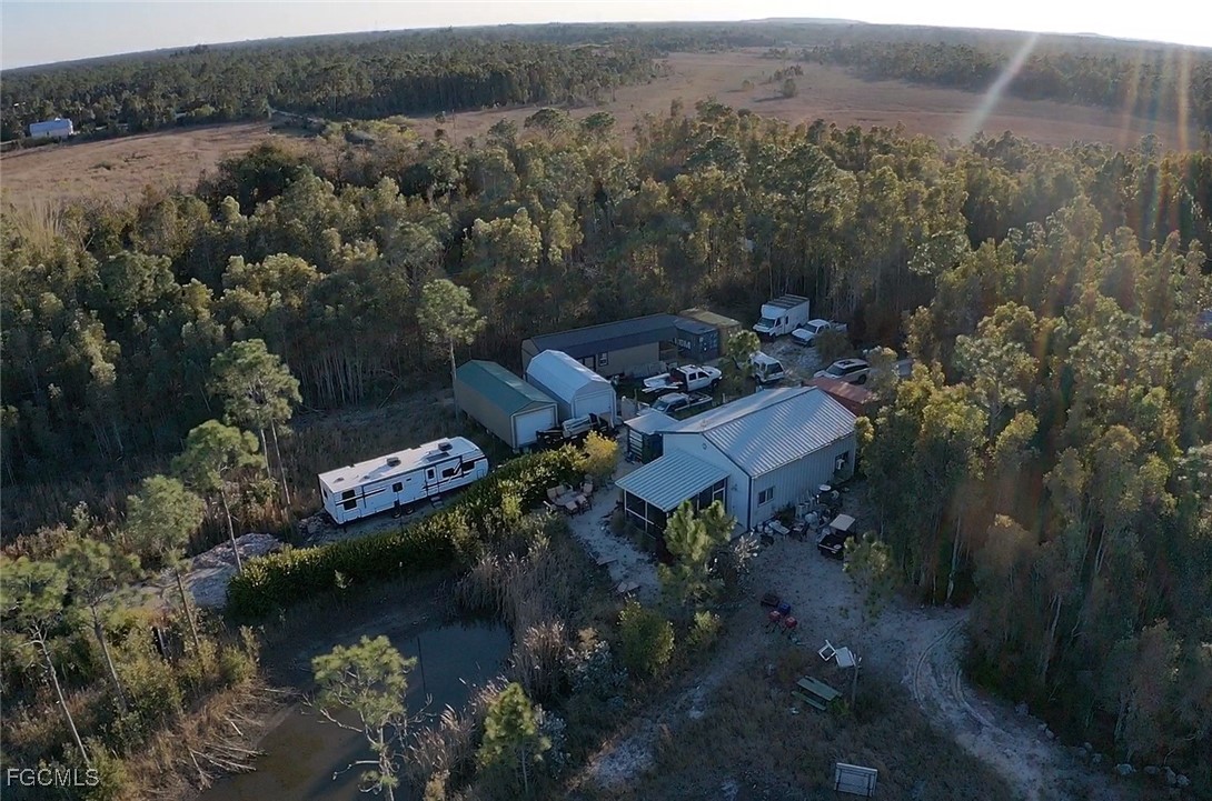 32576 Oil Well Road Punta Gorda, FL 33955 - Photo 25 of 30 an aerial view of a house with a yard