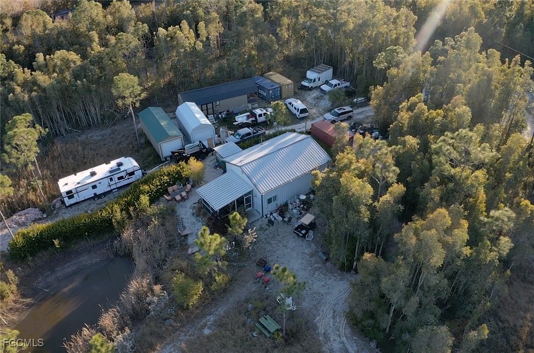 32576 Oil Well Road Punta Gorda, FL 33955 - Photo 27 of 30 an aerial view of a house with a yard