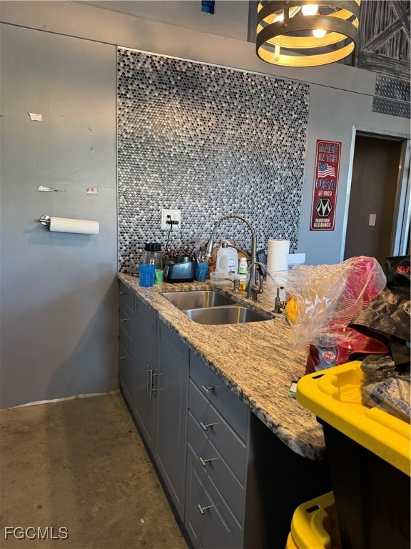 32576 Oil Well Road Punta Gorda, FL 33955 - Photo 5 of 30 a bathroom with a granite countertop sink and a mirror