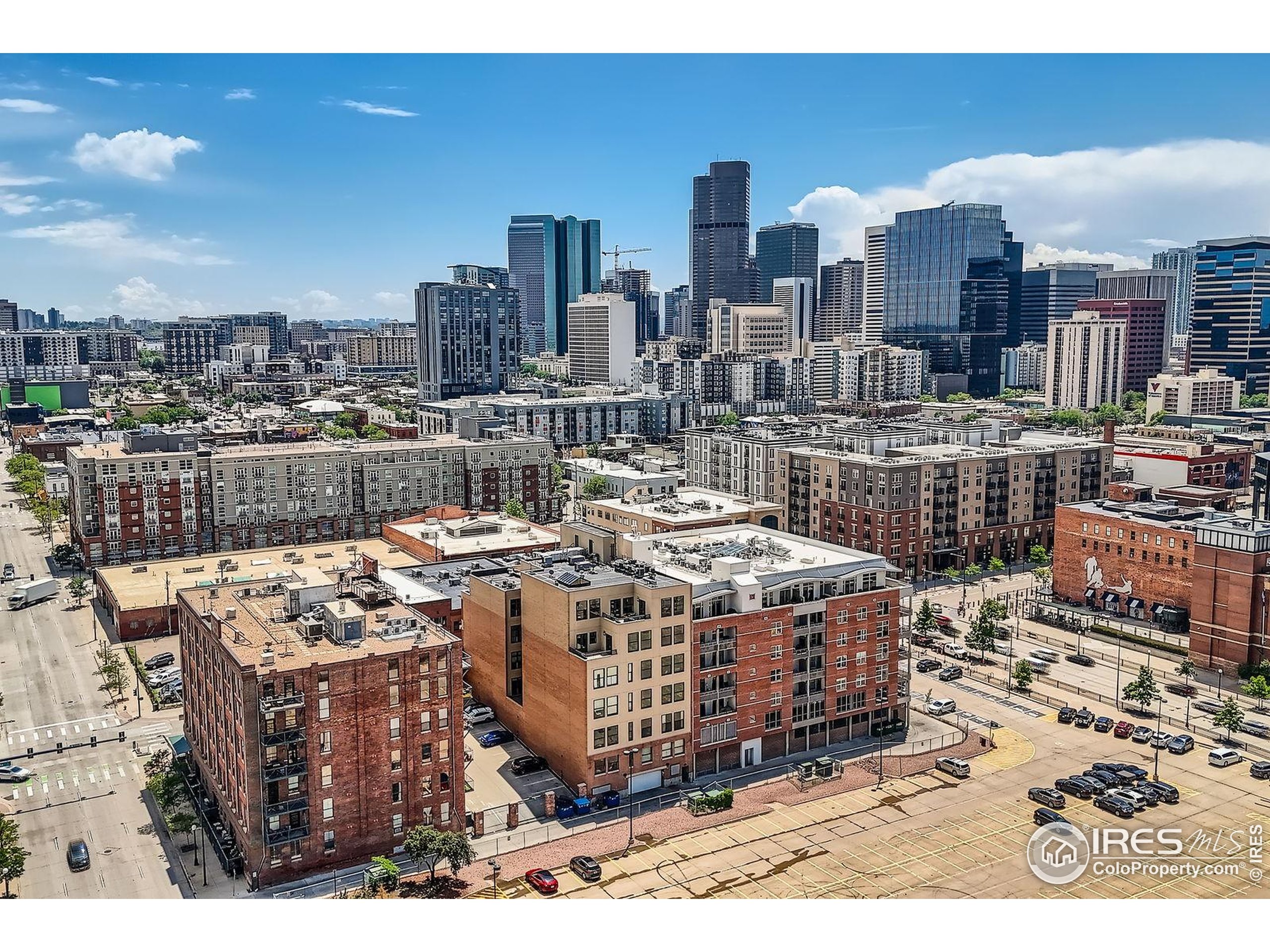 2245 Blake Street, Unit D Denver, CO 80205 - Photo 25 of 36 a city view with tall buildings