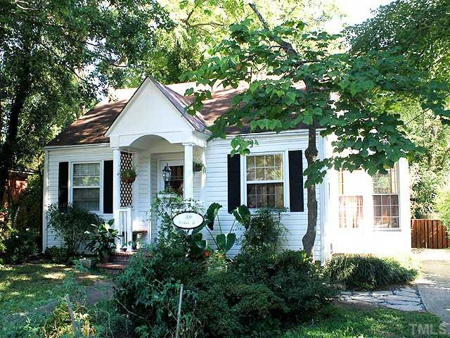 309 Cedar Street Raleigh, NC 27604 - Photo 2 of 25 Another look at the front reveals the sunroom and driveway back to the garages. Exterior Front