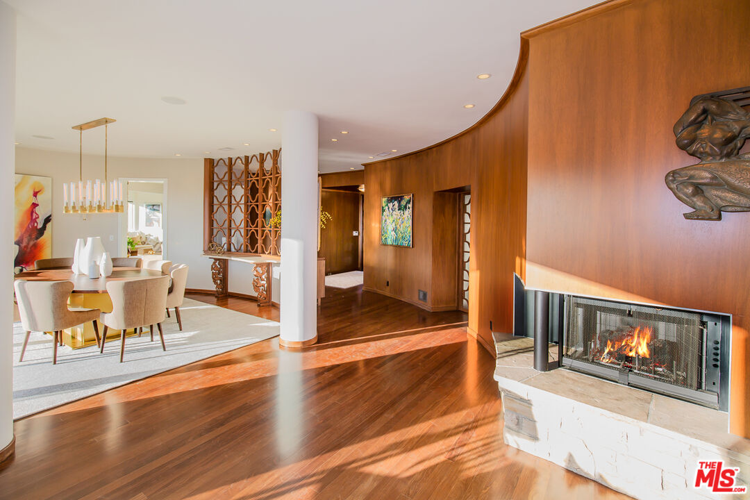 1131 Miradero Road Beverly Hills, CA 90210 - Photo 6 of 42 a view of a living room and hardwood floor