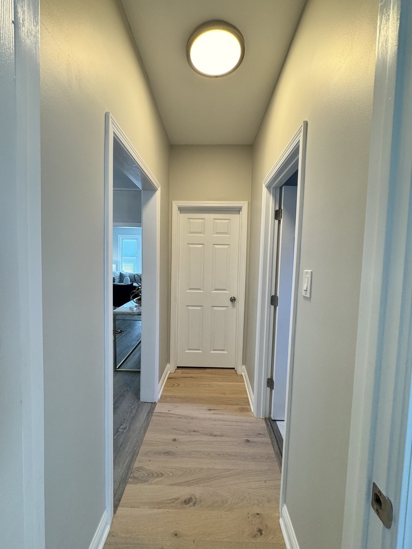 822 East 87th Place Chicago, IL 60619 - Photo 13 of 31 a view of a hallway with a dining room