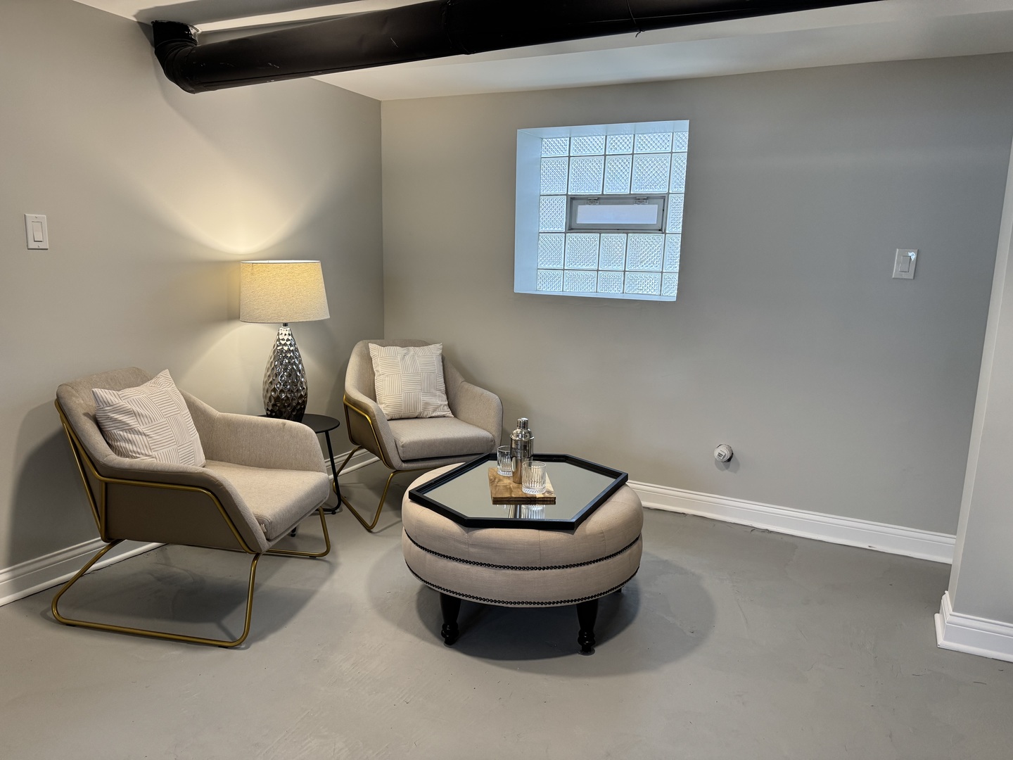 822 East 87th Place Chicago, IL 60619 - Photo 24 of 31 a living room with furniture and a lamp