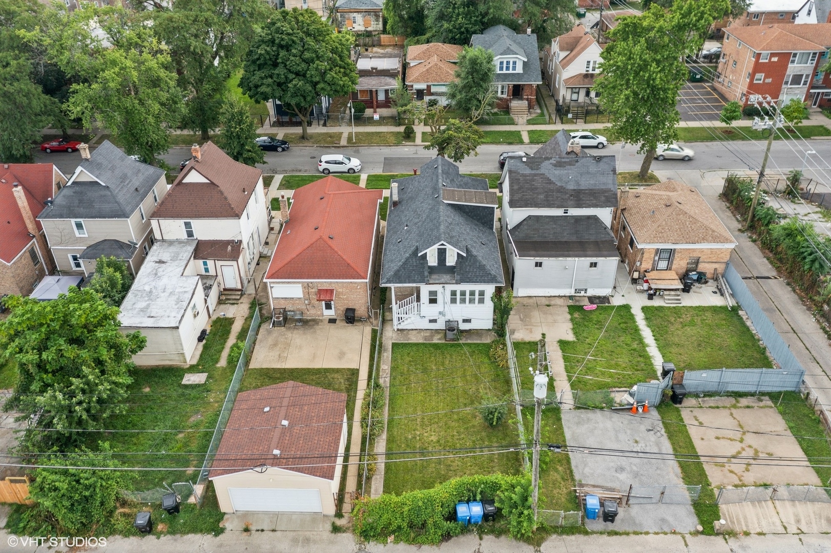 822 East 87th Place Chicago, IL 60619 - Photo 28 of 31 an aerial view of residential houses with outdoor space and street view