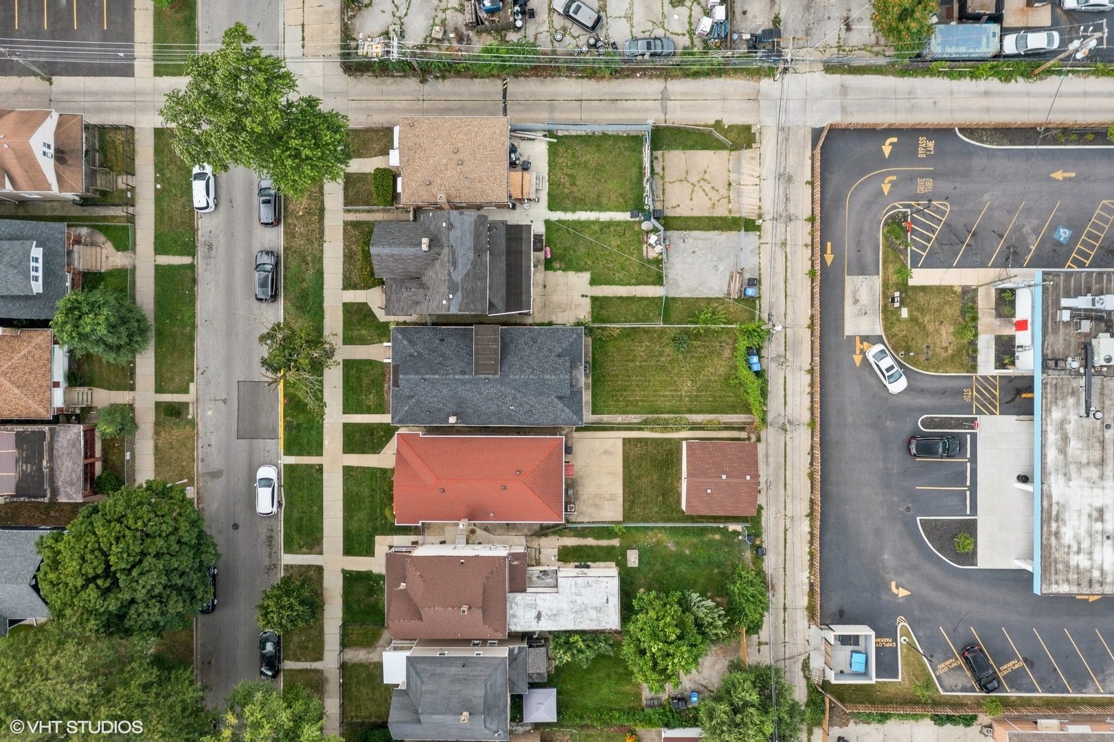 822 East 87th Place Chicago, IL 60619 - Photo 30 of 31 an aerial view of residential houses with outdoor space and parking