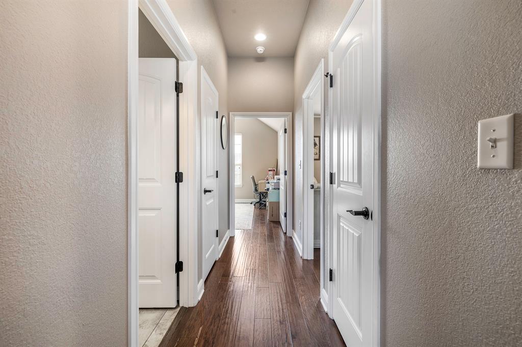 9142 Parkview Circle Tolar, TX 76476 - Photo 22 of 31 a view of hallway with wooden floor