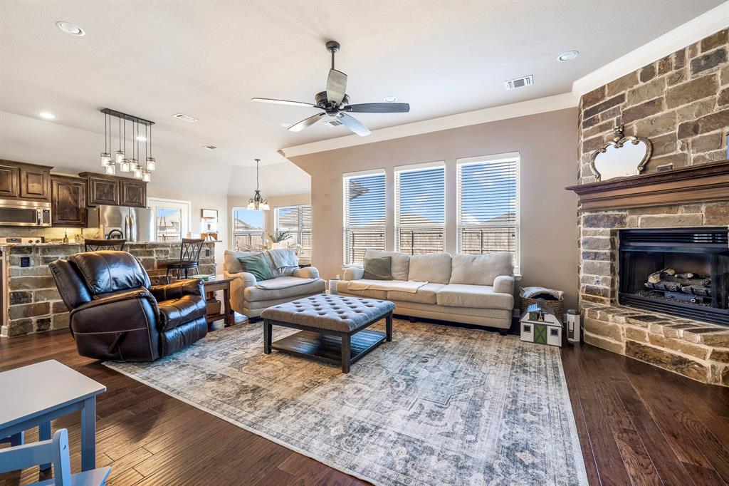 9142 Parkview Circle Tolar, TX 76476 - Photo 24 of 31 a living room with furniture and a fireplace