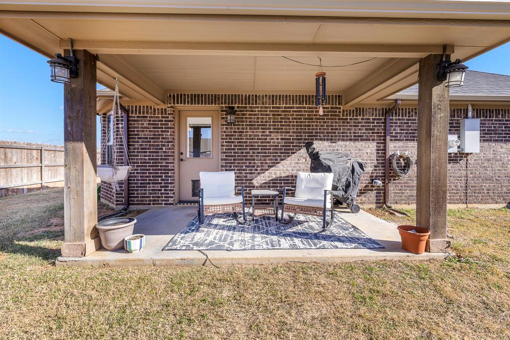 9142 Parkview Circle Tolar, TX 76476 - Photo 4 of 31 a living room with a rug