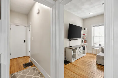 a view of a kitchen from the hallway