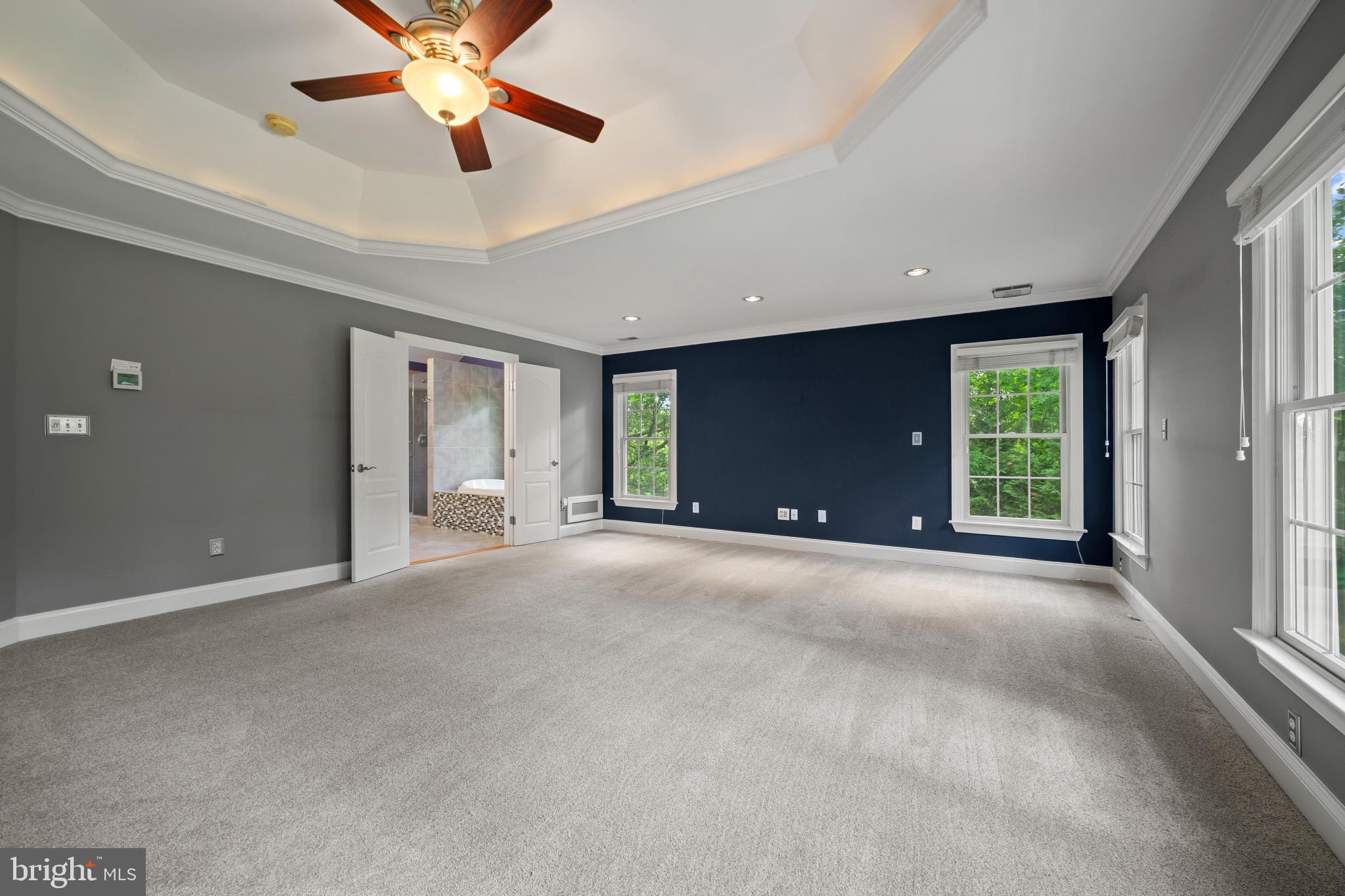 12221 Jerusalem Road Kingsville, MD 21087 - Photo 24 of 66 a view of an empty room with window and a ceiling fan