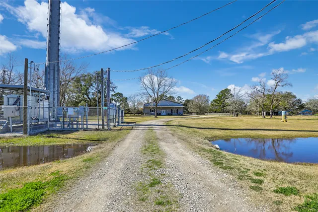 a view of a swimming pool with an outdoor space and seating area