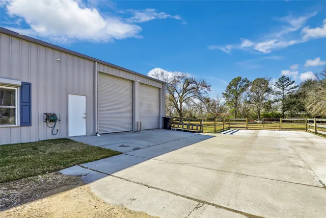 a view of a chairs and table in the patio