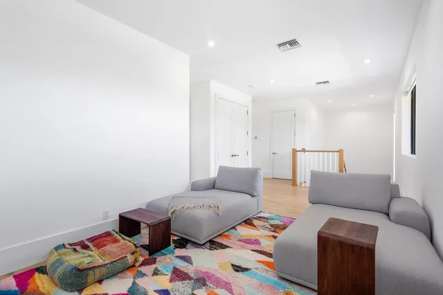 a living room with furniture and a couch