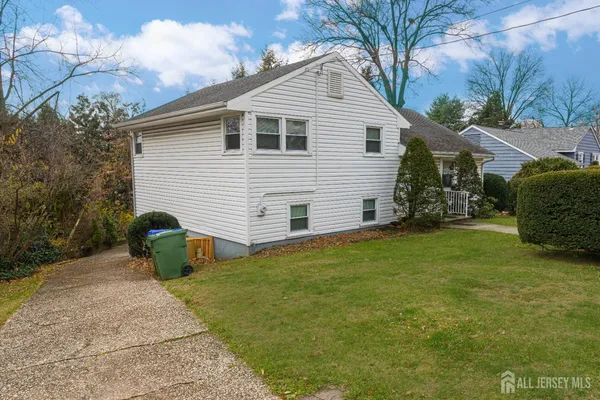 a aerial view of a house with backyard
