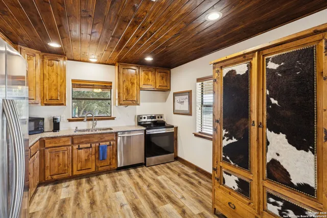 a view of swimming pool with a patio