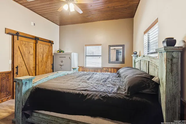 a view of a swimming pool with a yard