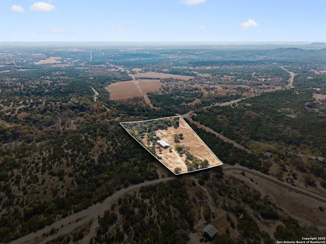 a view of a lake with mountains in the background