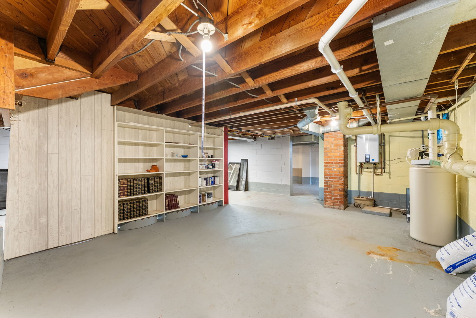 1419 113th Avenue Milan, IL 61264 - Photo 19 of 25 a view of an empty room with storage