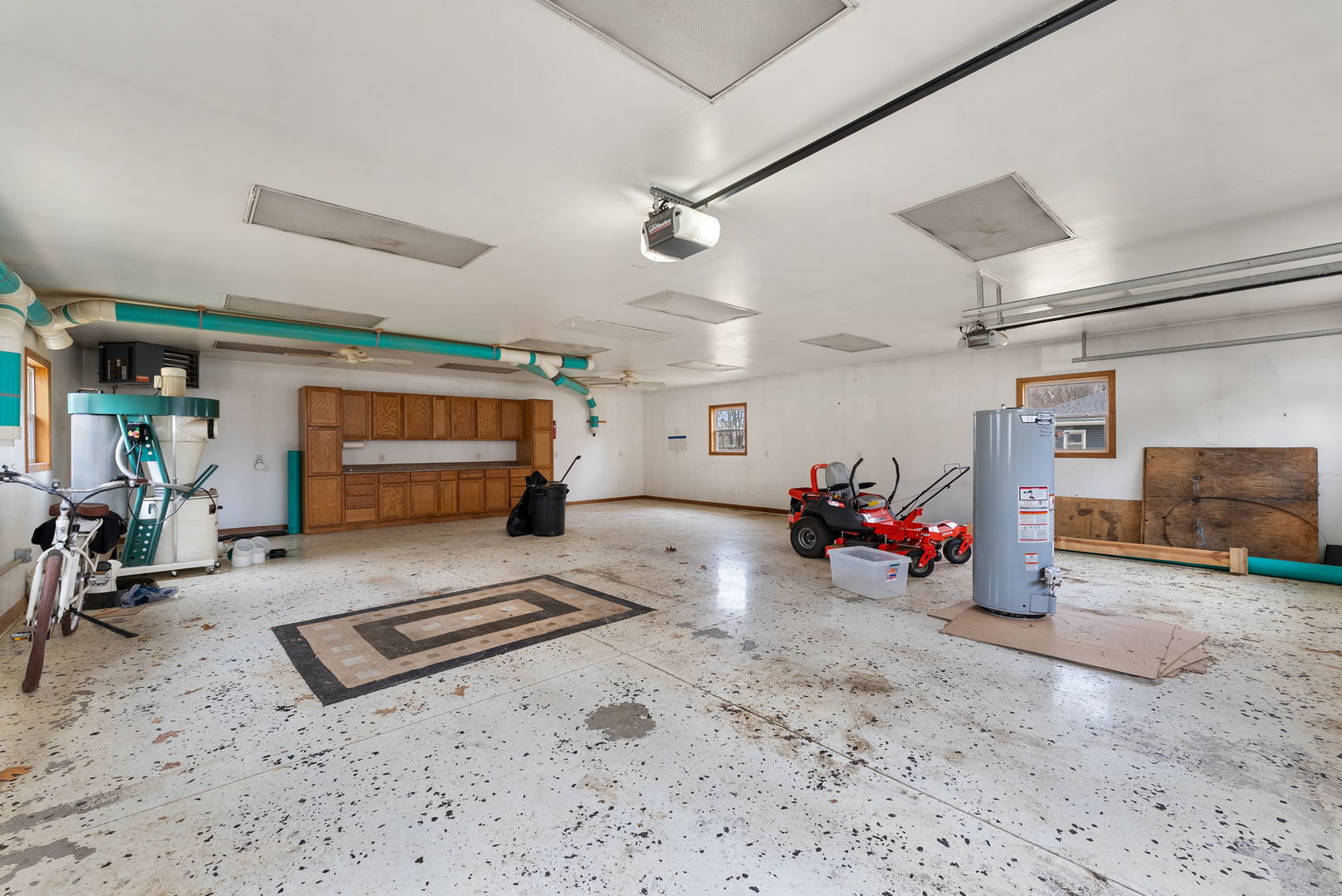 1419 113th Avenue Milan, IL 61264 - Photo 23 of 25 a view of a garage with rack and bicycle