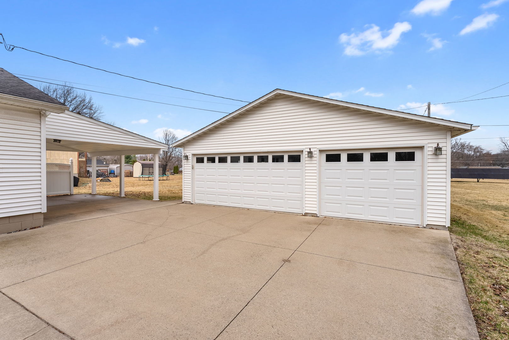 1419 113th Avenue Milan, IL 61264 - Photo 3 of 25 a view of a house with a garage