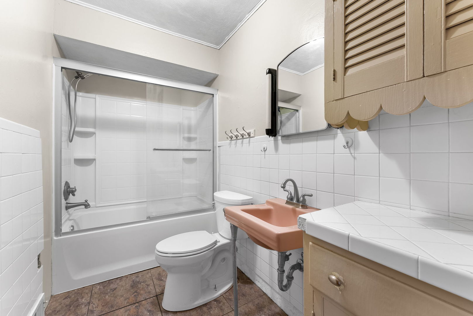 1419 113th Avenue Milan, IL 61264 - Photo 9 of 25 a bathroom with a sink a toilet and shower