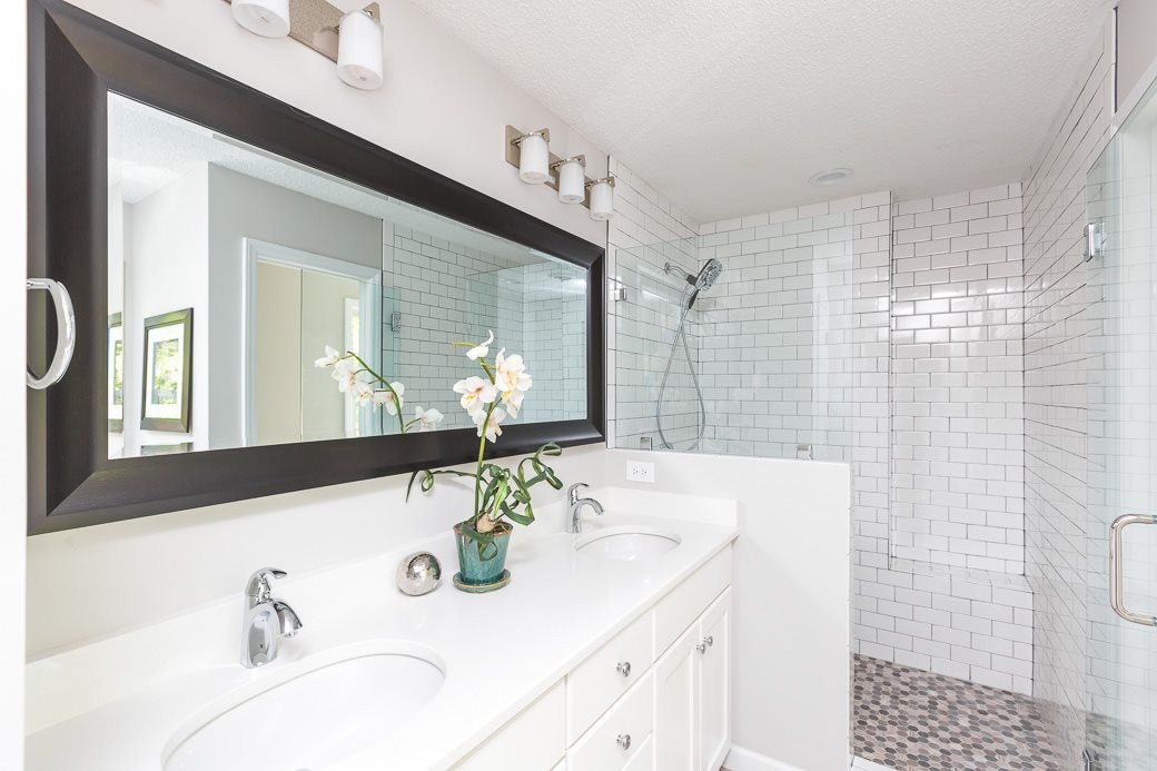 5508 Dutchman Drive Raleigh, NC 27606 - Photo 7 of 15 New cabinetry, custom WALK-IN shower and gorgeous tile work; another view of the updated master bath. Master Bath/Spa