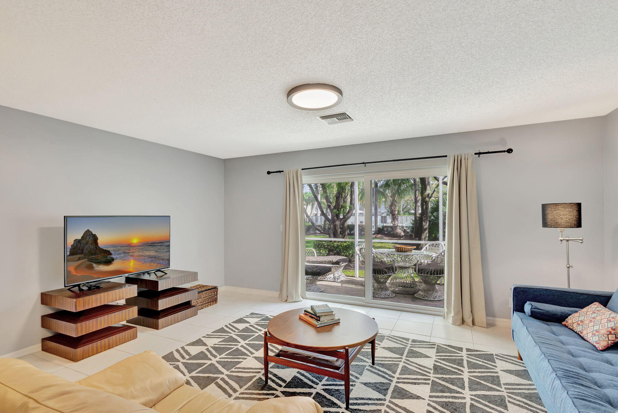 145 Timberwalk Trail Jupiter, FL 33458 - Photo 19 of 61 a living room with furniture and a window