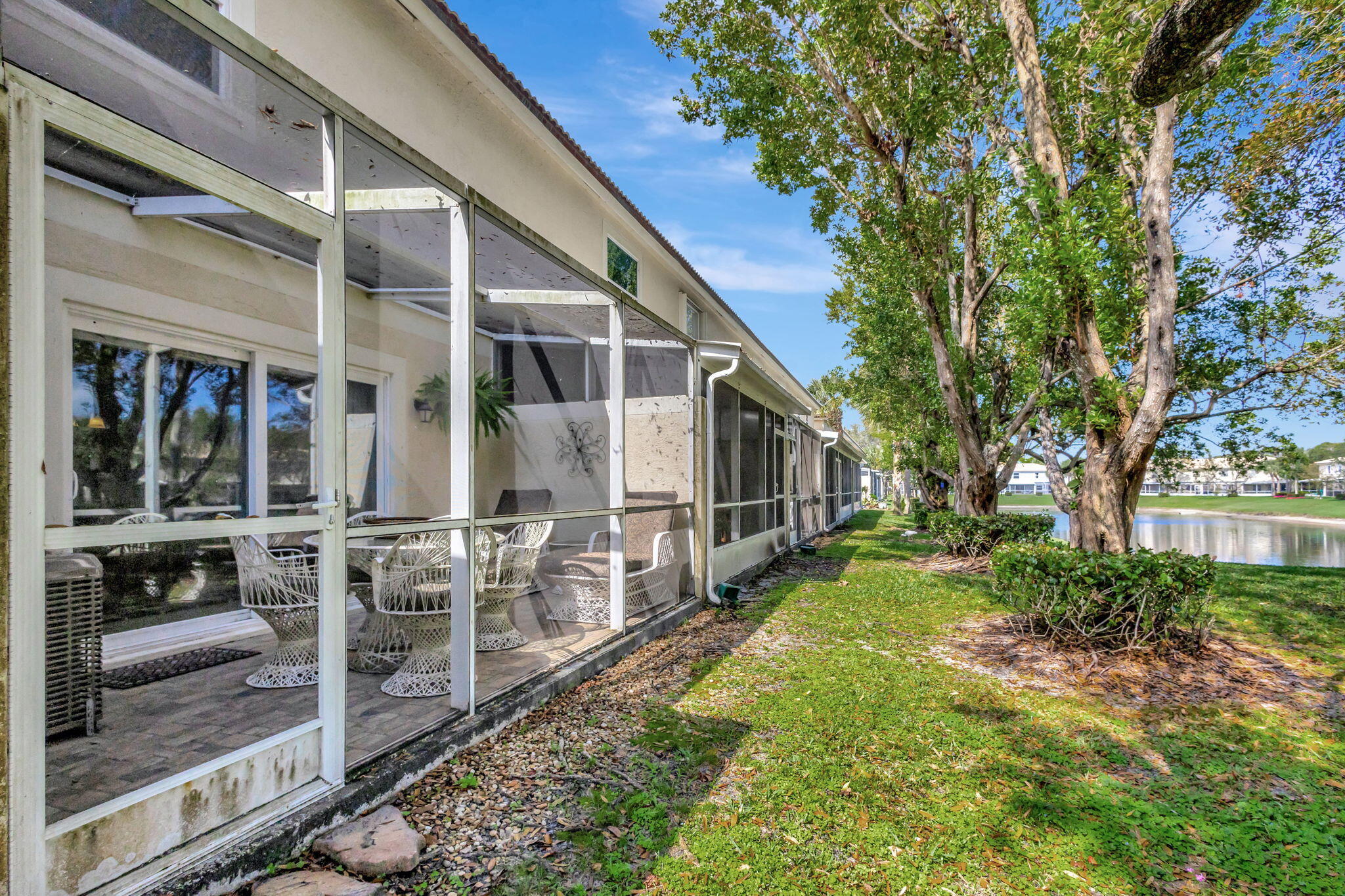 145 Timberwalk Trail Jupiter, FL 33458 - Photo 40 of 61 a view of a house with backyard and sitting area