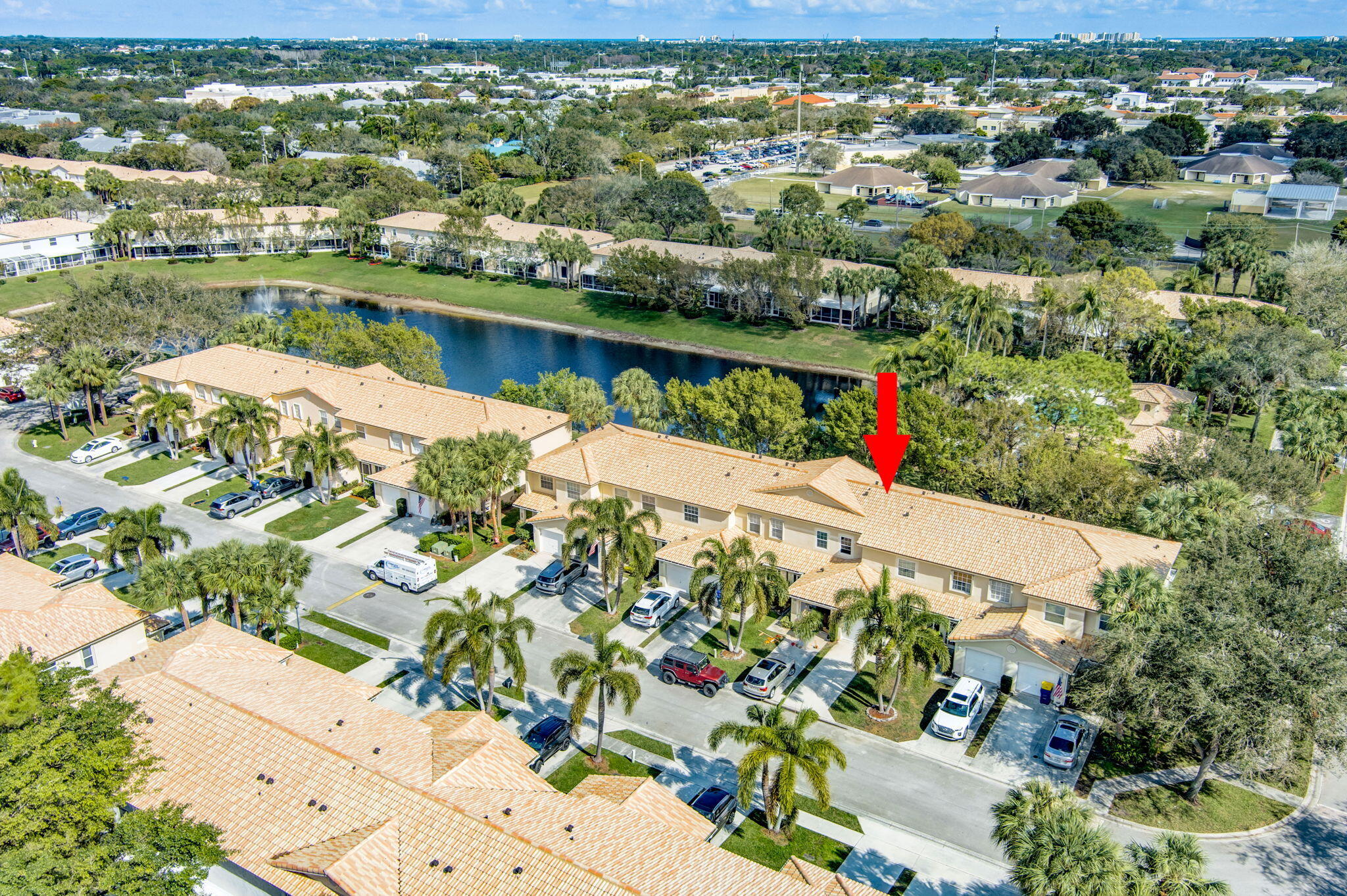 145 Timberwalk Trail Jupiter, FL 33458 - Photo 49 of 61 an aerial view of lake and residential houses with outdoor space