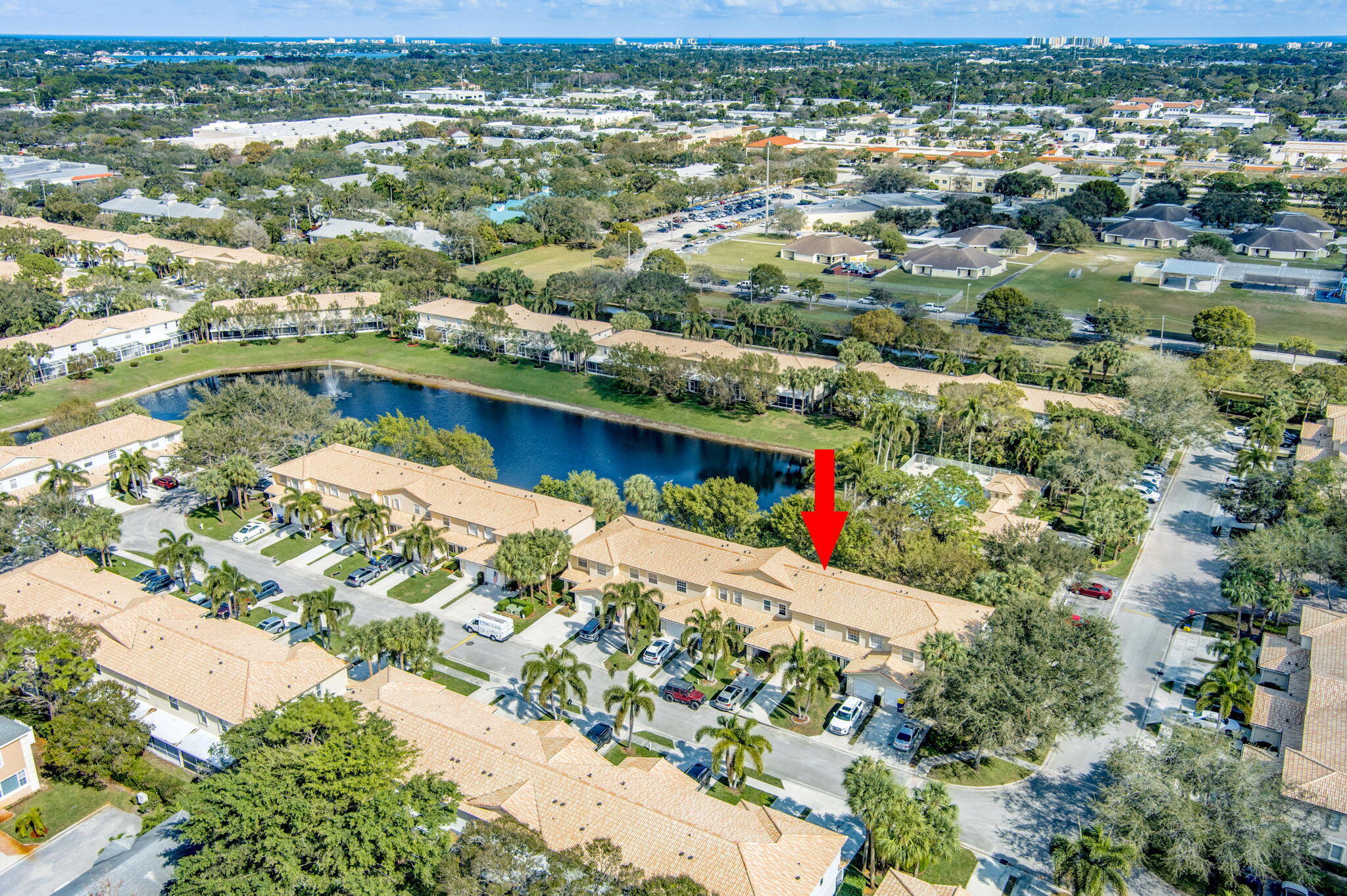 145 Timberwalk Trail Jupiter, FL 33458 - Photo 50 of 61 an aerial view of residential houses with outdoor space and river