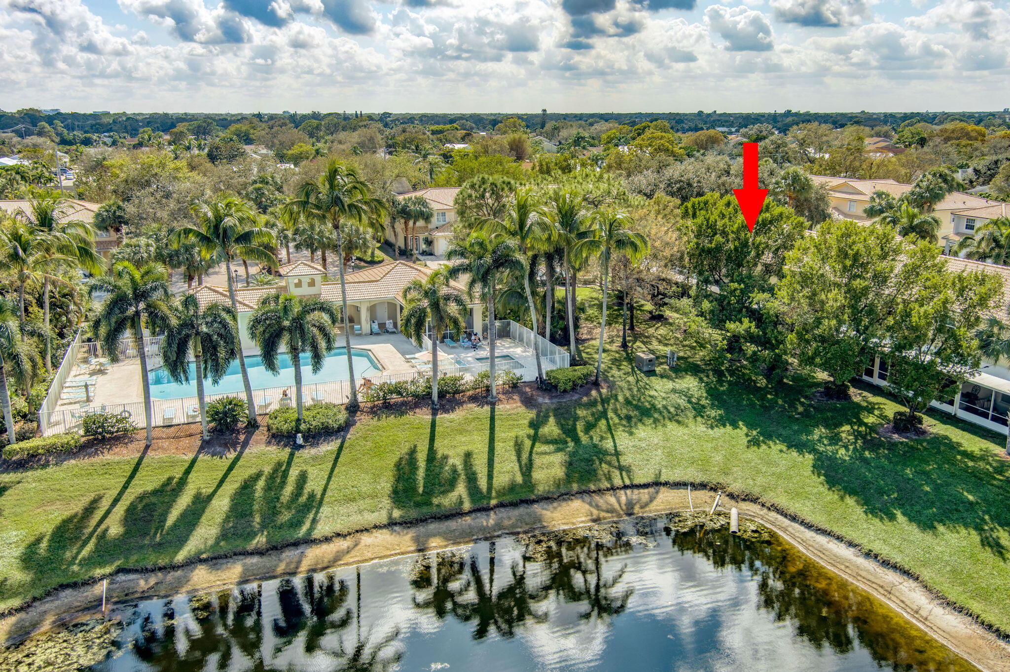 145 Timberwalk Trail Jupiter, FL 33458 - Photo 59 of 61 a view of swimming pool and lake