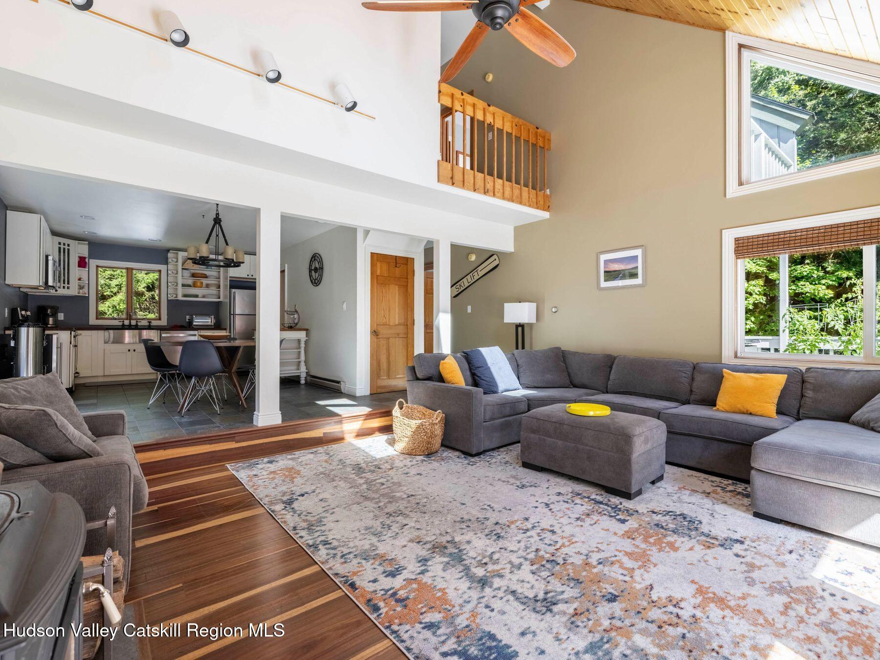 36 Mt Greenery Road Windham, NY 12496 - Photo 15 of 60 a living room with furniture and a large window