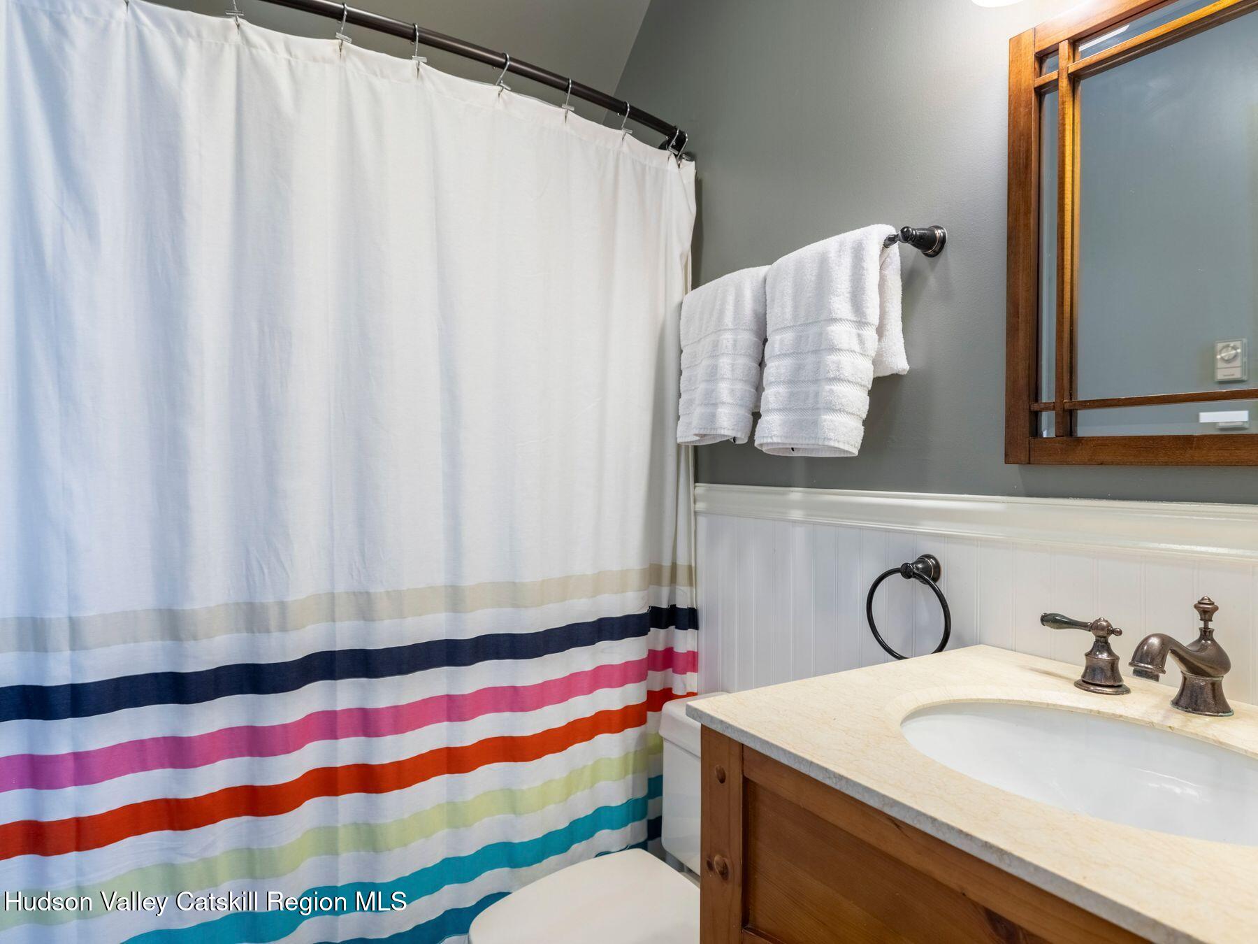 36 Mt Greenery Road Windham, NY 12496 - Photo 31 of 60 a bathroom with a sink and a mirror