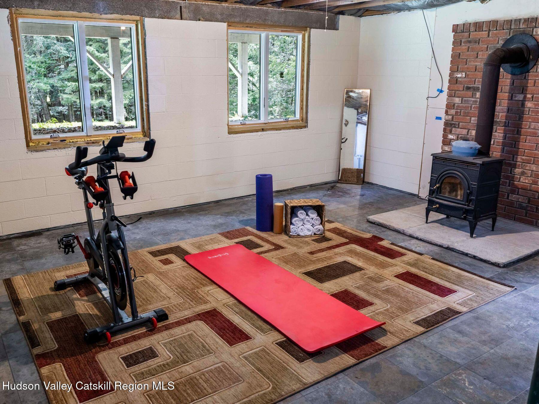 36 Mt Greenery Road Windham, NY 12496 - Photo 33 of 60 a room with gym equipment and a wooden floor