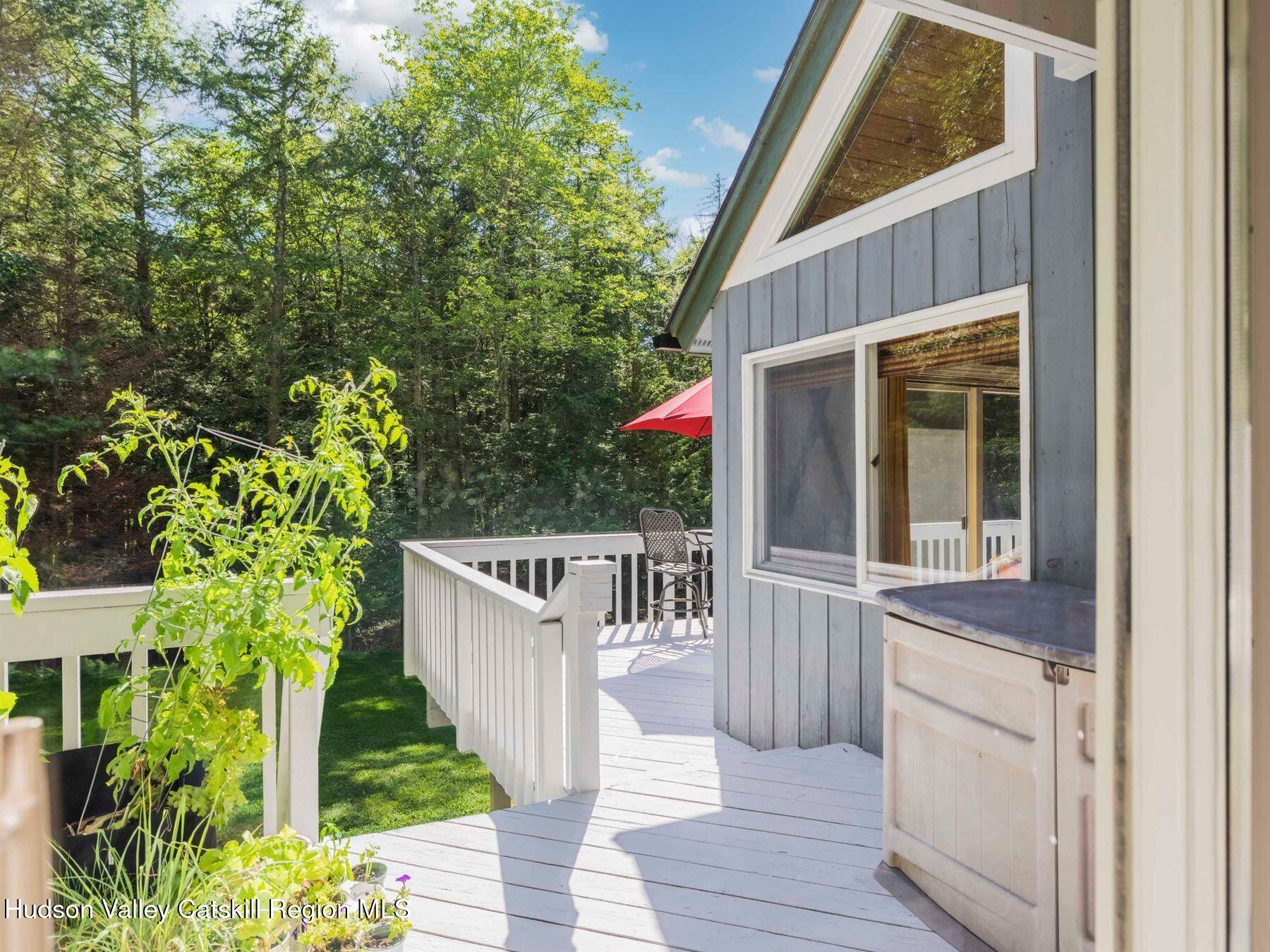 36 Mt Greenery Road Windham, NY 12496 - Photo 39 of 60 a view of a house with a small yard and wooden fence