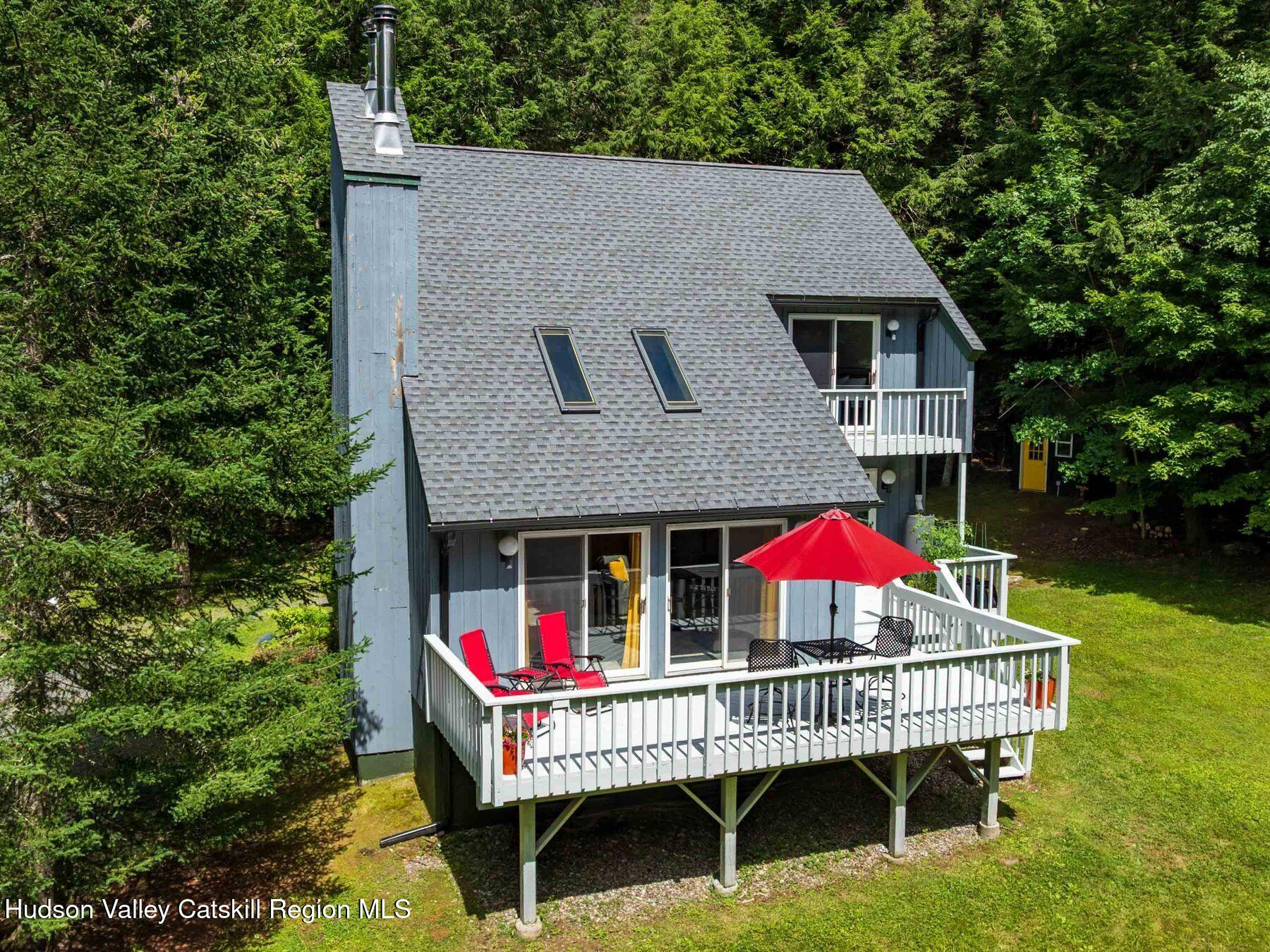 36 Mt Greenery Road Windham, NY 12496 - Photo 4 of 60 a view of house with swimming pool and a yard