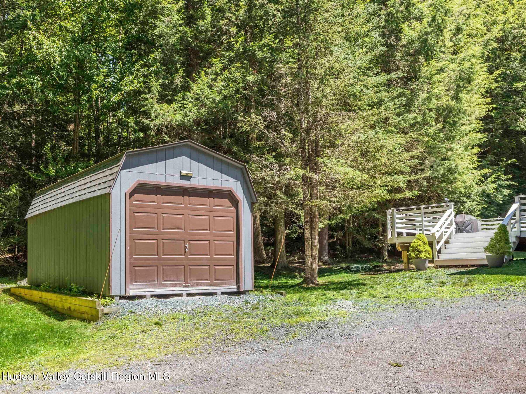 36 Mt Greenery Road Windham, NY 12496 - Photo 50 of 60 a front view of a house with a garden