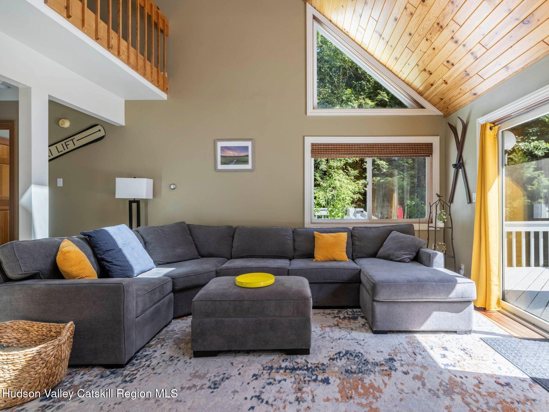 36 Mt Greenery Road Windham, NY 12496 - Photo 10 of 60 a living room with furniture and a large window