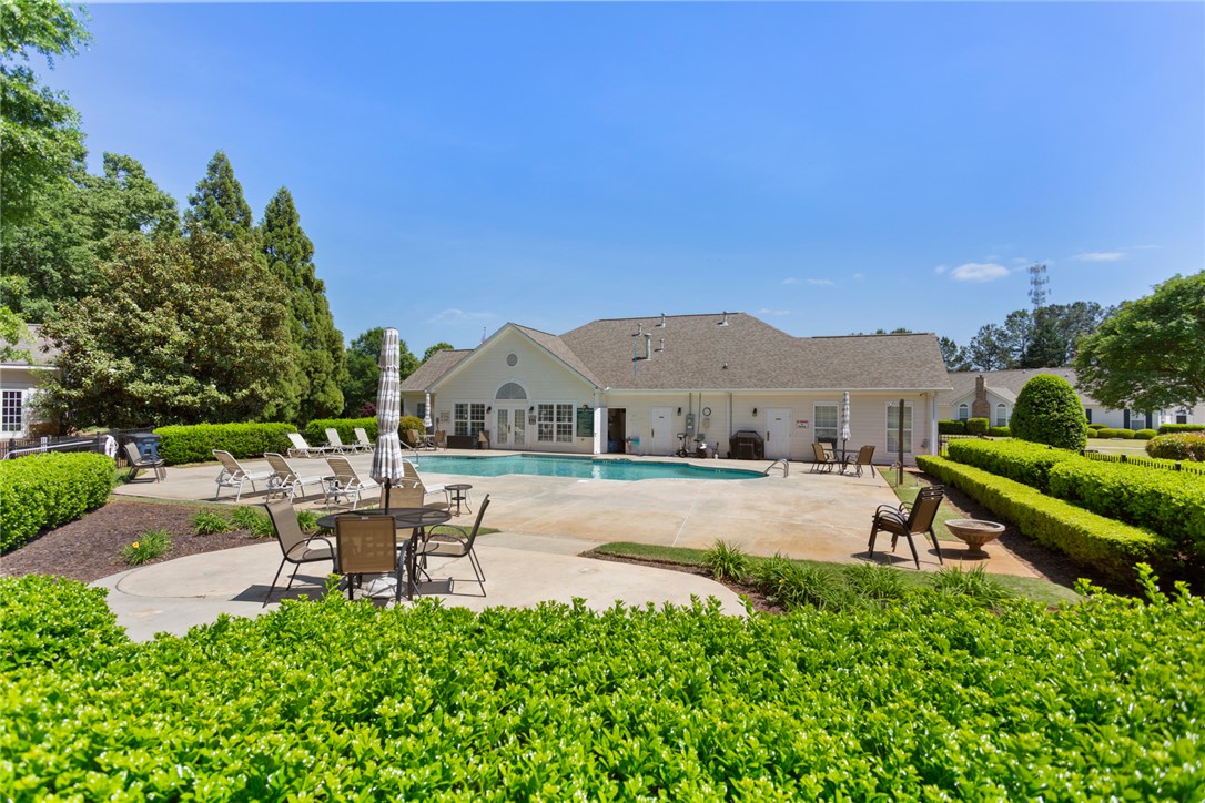 155 Life Style Lane Anderson, SC 29621 - Photo 41 of 49 This spacious pool area offers a refreshing escape with ample room for relaxation and recreation.