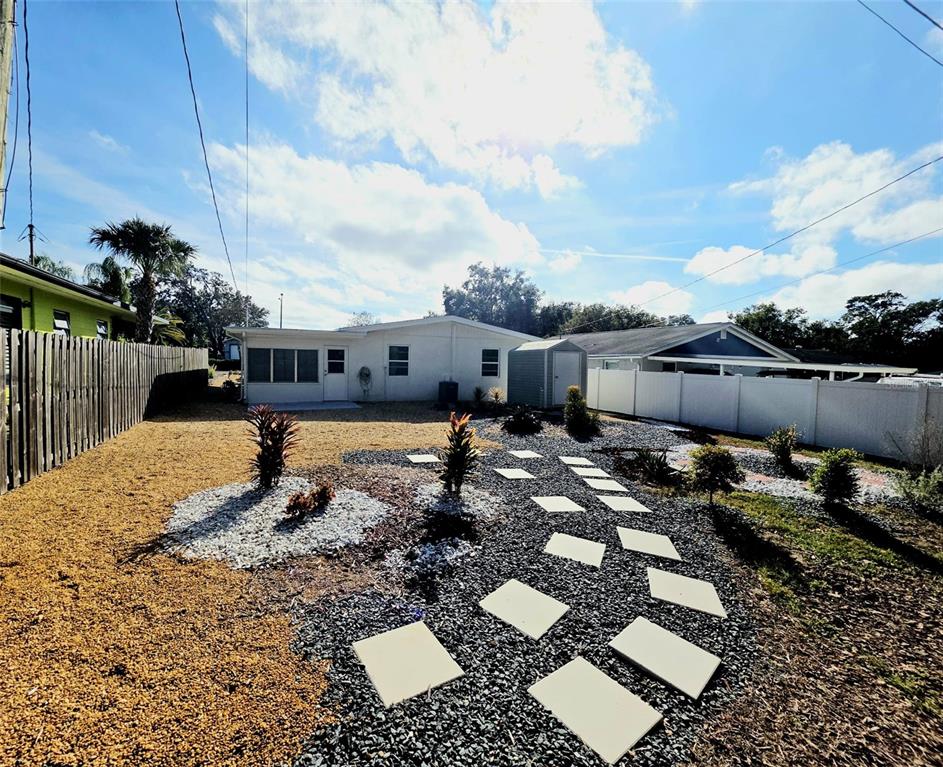 6309 Central Avenue New Port Richey, FL 34653 - Photo 17 of 18 a view of a yard with sitting area