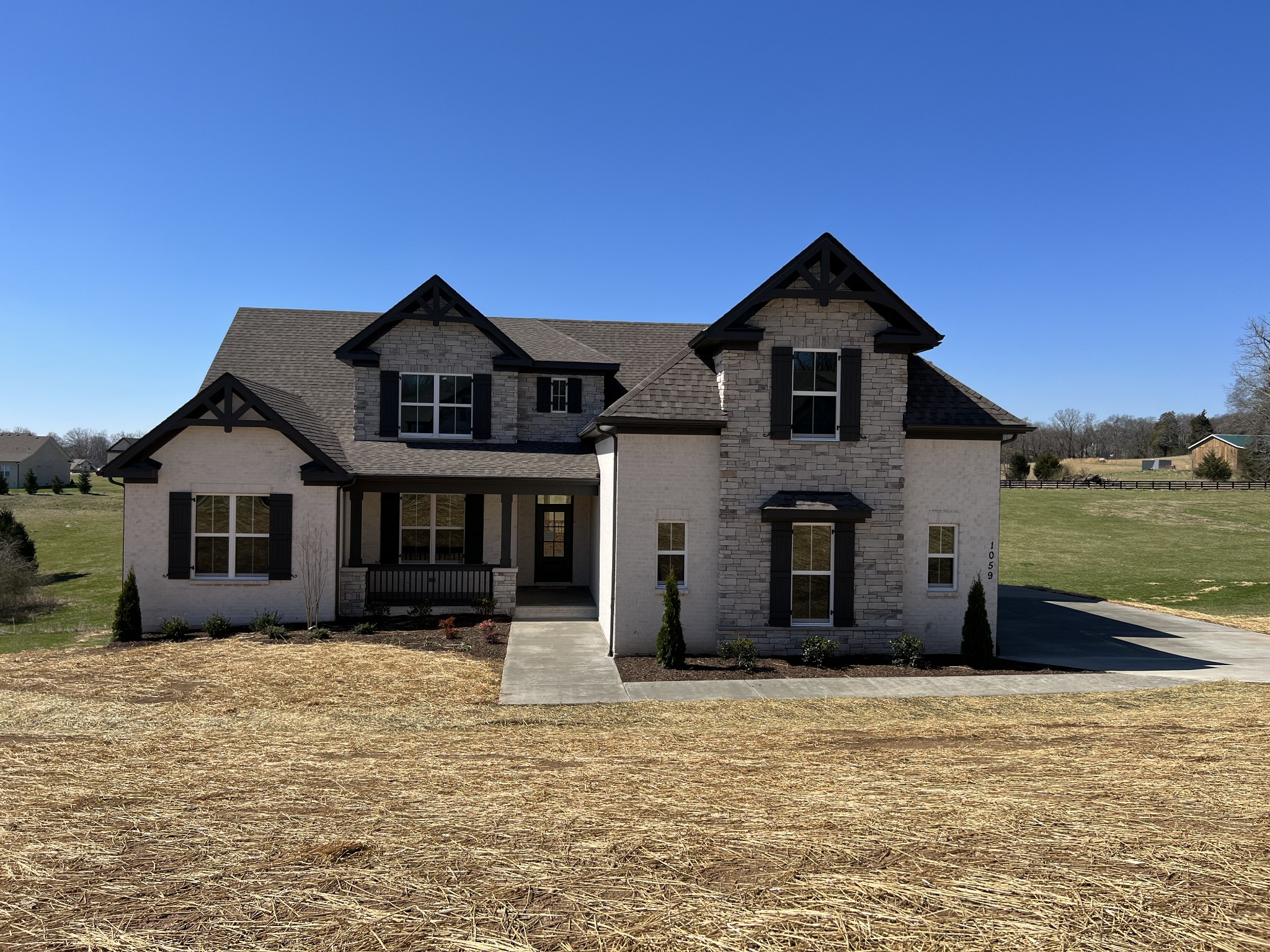 1059 Hideaway Road Columbia, TN 38401 - Photo 1 of 15 a front view of a house with a yard