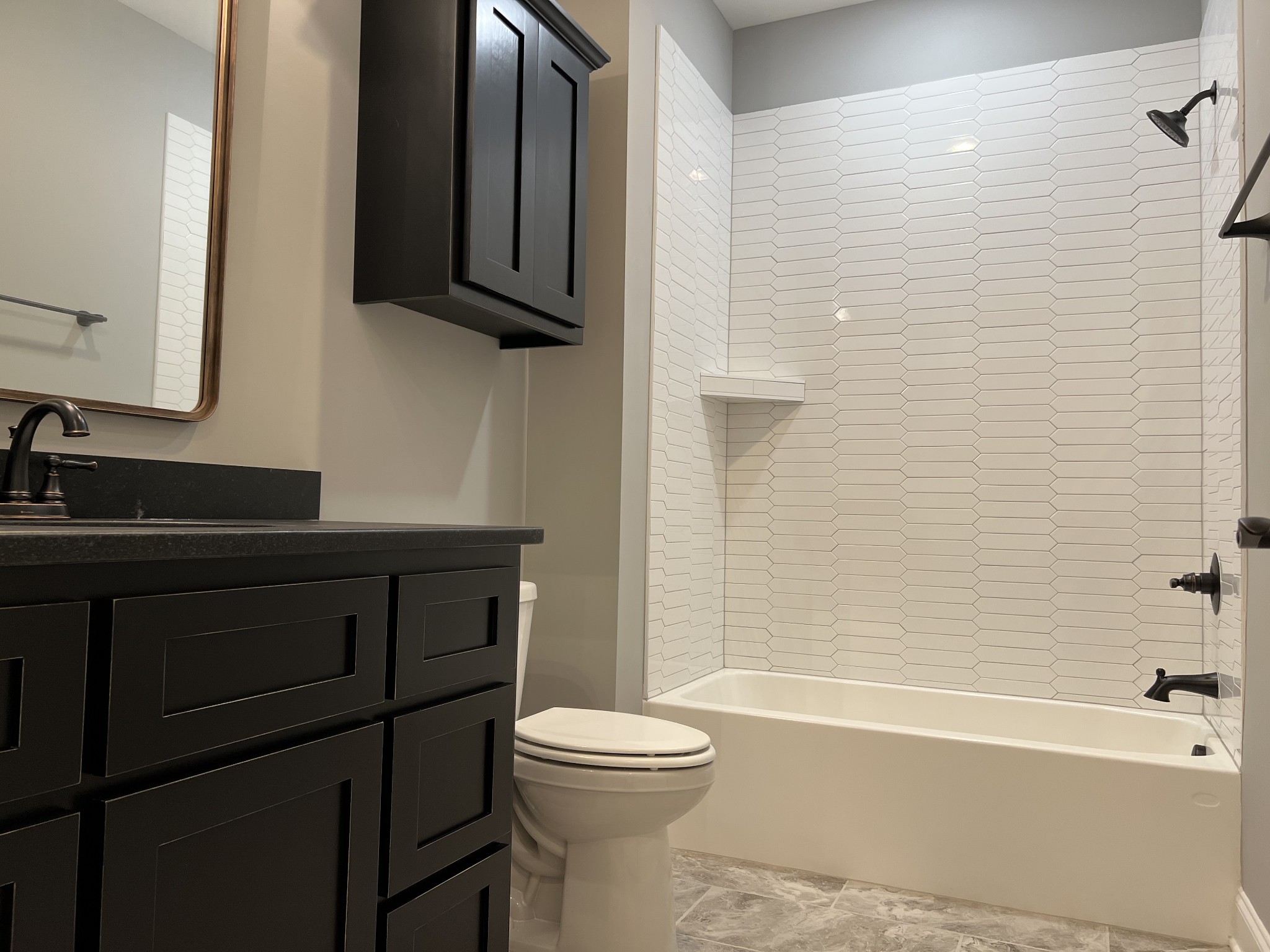 1059 Hideaway Road Columbia, TN 38401 - Photo 11 of 15 a bathroom with a sink a toilet and bathtub